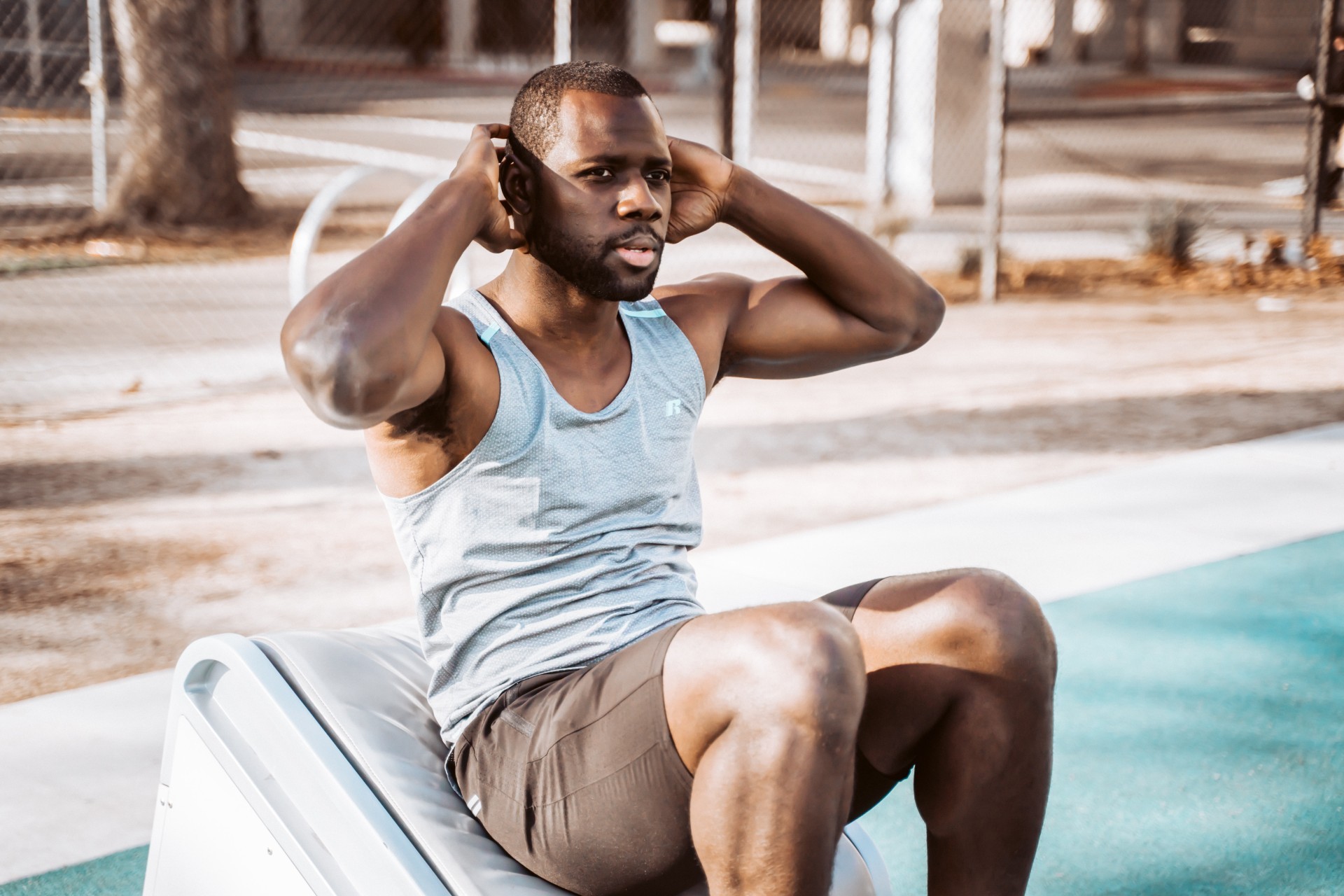 Man doing sit-ups to improve his health