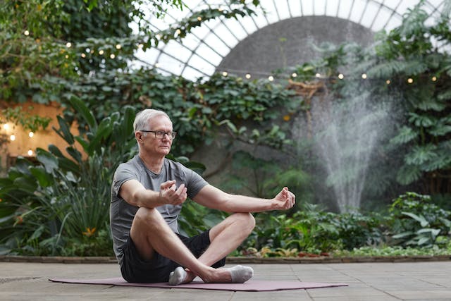 Man meditating to manage stress