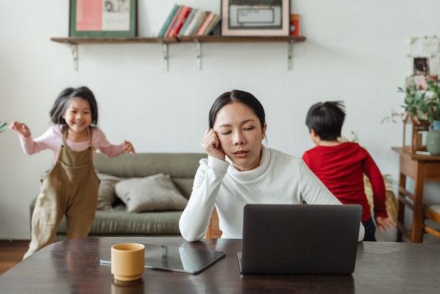 woman stressed out with kids